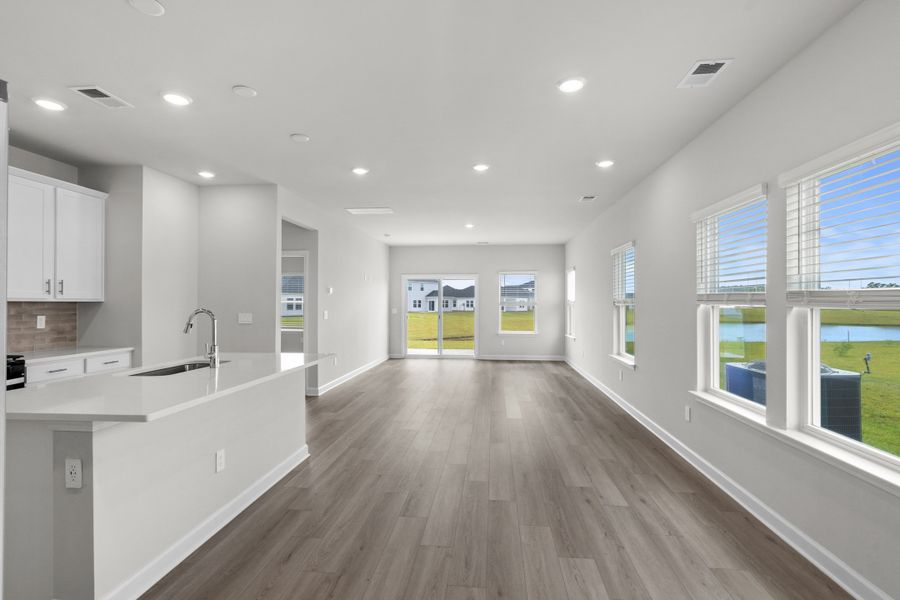 Spacious, unfurnished interior of a new home in Cypress Ridge - The Boardwalk Series, Longs (Image 15).