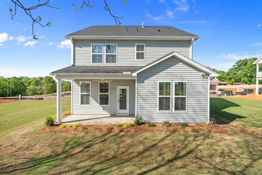 Front exterior of a new home in Six Oaks, Summerville, SC, highlighting curb appeal (Image 21).