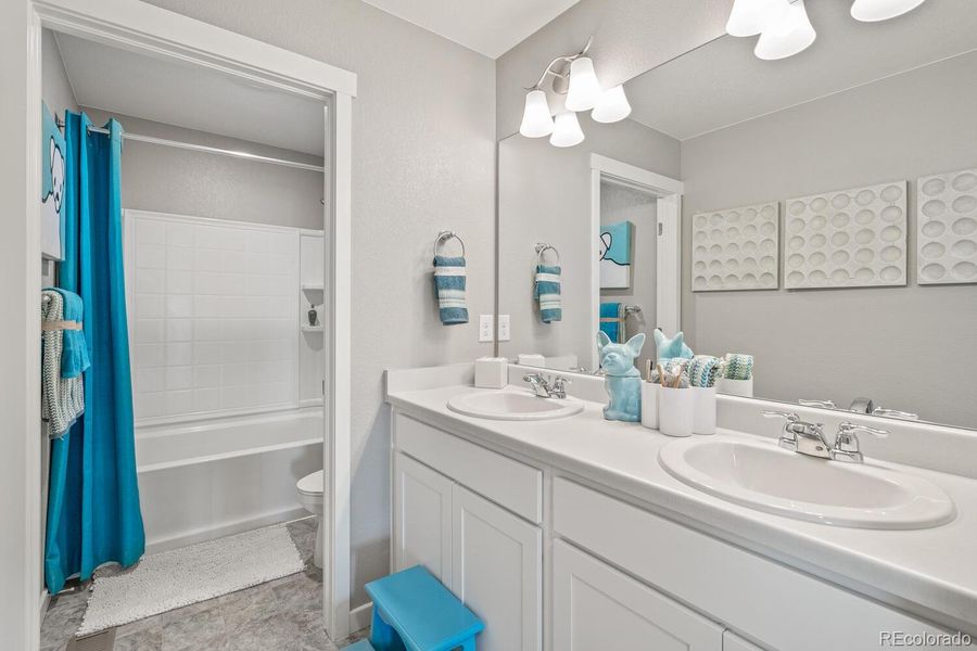 Furnished interior view inside a new home in Trails at Crowfoot, Parker (Image 25).