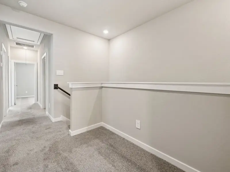 Spacious, unfurnished interior of a new home in Bridge Creek Village - City Series, Cypress (Image 20). Spacious, unfurnished interior of a new home in Bridge Creek Village - City Series, Cypress (Image 20).