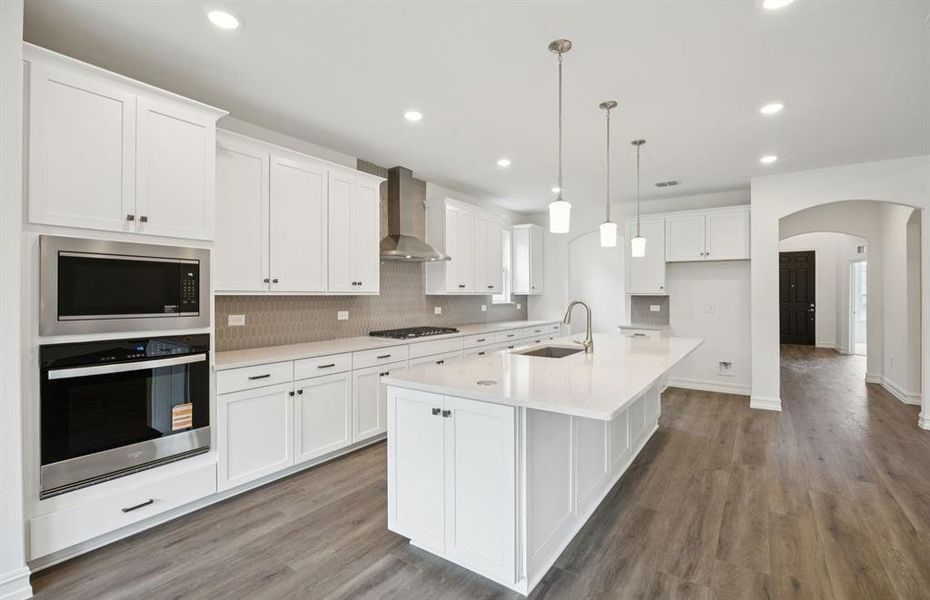 Spacious kitchen with ample cabinet space Spacious kitchen with ample cabinet space