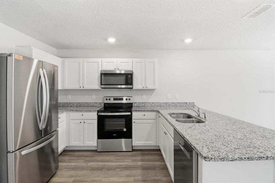 Furnished interior view inside a new home in , Dunnellon (Image 9).