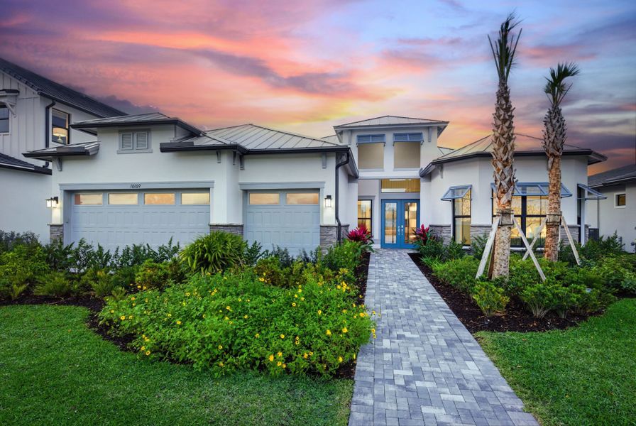 Front exterior of a new home in Amara, Lake Worth, FL, highlighting curb appeal (Image 20). Front exterior of a new home in Amara, Lake Worth, FL, highlighting curb appeal (Image 20).