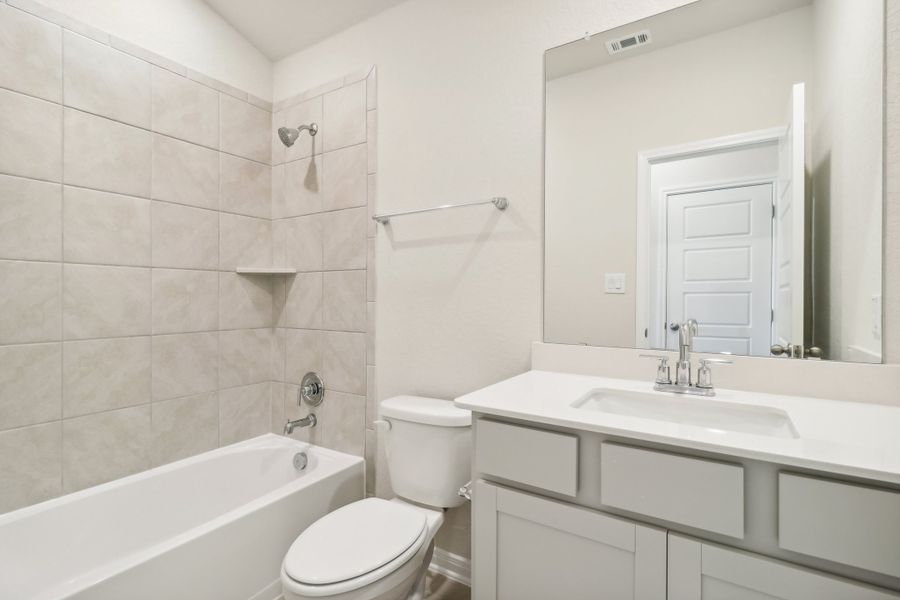 Guest bathroom in the Briscoe floorplan at a Meritage Homes community.