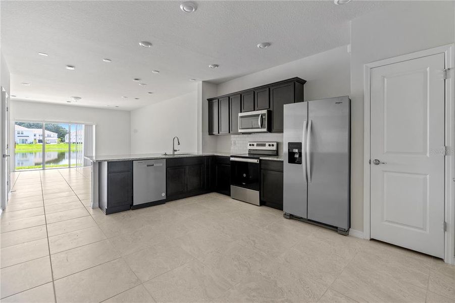 Furnished interior view inside a new home in , Kissimmee (Image 7). Furnished interior view inside a new home in , Kissimmee (Image 7).