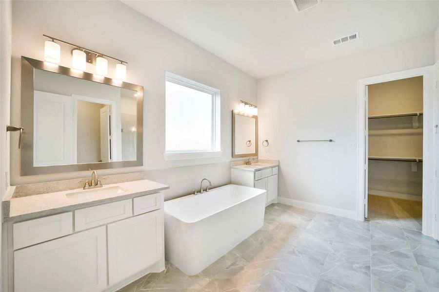 Furnished interior view inside a new home in Sienna 65', Missouri City (Image 7).