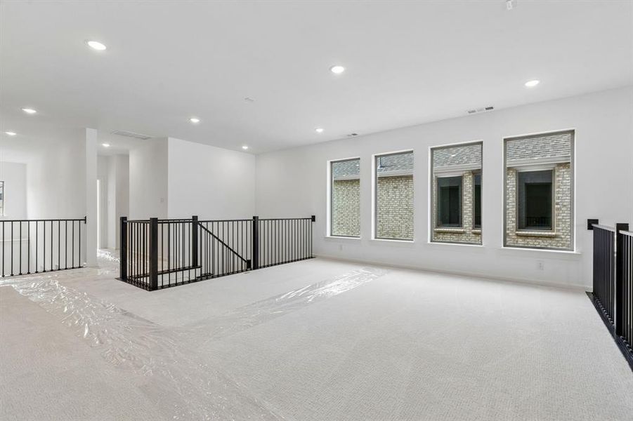 Tons of family fun to be had in this wonderful, light filled game room!