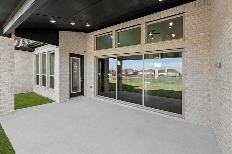 Exterior details and patio area of a home in Parker Ranch, Parker (Image 4).