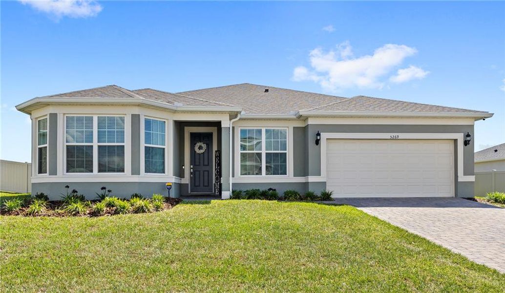 Front exterior of a new home in , Mount Dora, FL, highlighting curb appeal (Image 21).