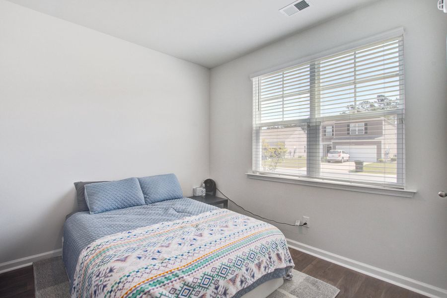 Furnished interior view inside a new home in Pine Hills at Cane Bay, Summerville (Image 37).