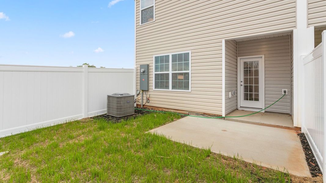 Exterior details and patio area of a home in Henley Ridge, Graham (Image 3). Exterior details and patio area of a home in Henley Ridge, Graham (Image 3).