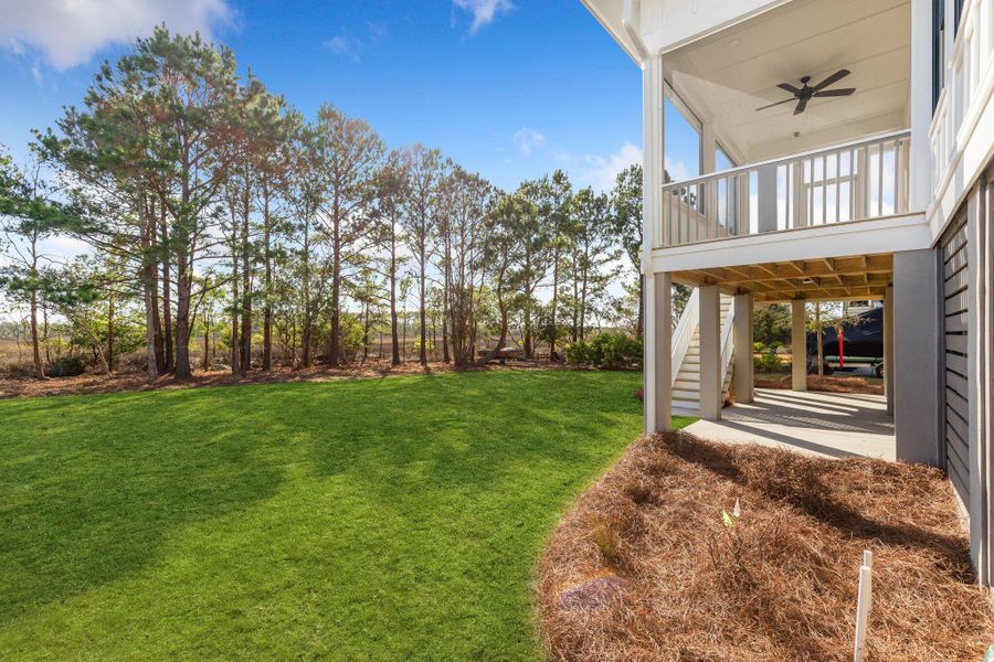 Exterior details and patio area of a home in Rivercroft, Awendaw (Image 3).