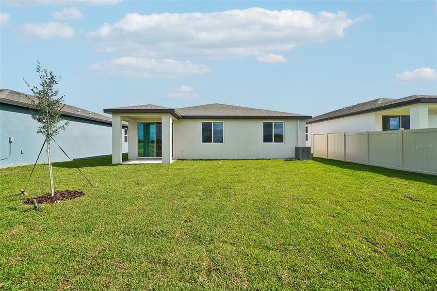 Exterior details and patio area of a home in Pine Ridge Meadows, Hudson (Image 23).