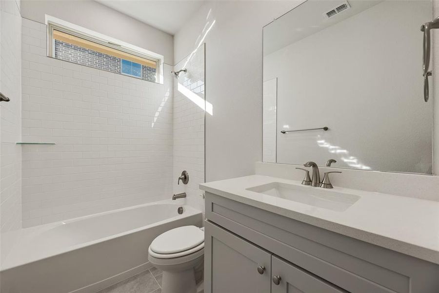 Furnished interior view inside a new home in Villages of Creekwood, Frisco (Image 9).