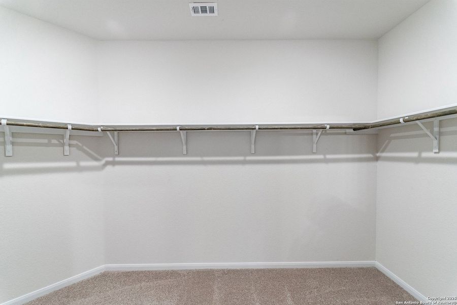 Spacious, unfurnished interior of a new home in Hunter's Ranch, San Antonio (Image 19).