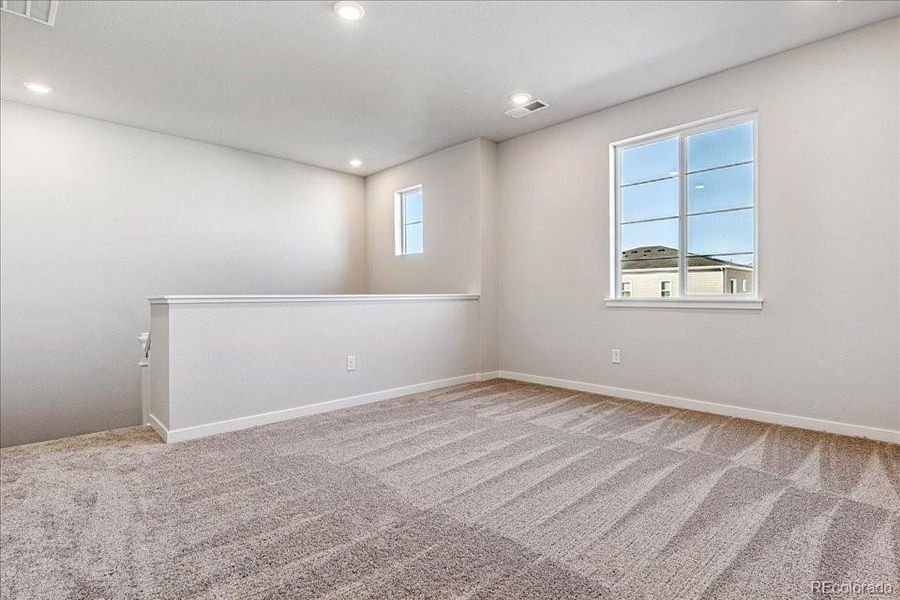 Spacious, unfurnished interior of a new home in Floret Collection at Alder Creek, Parker (Image 17).