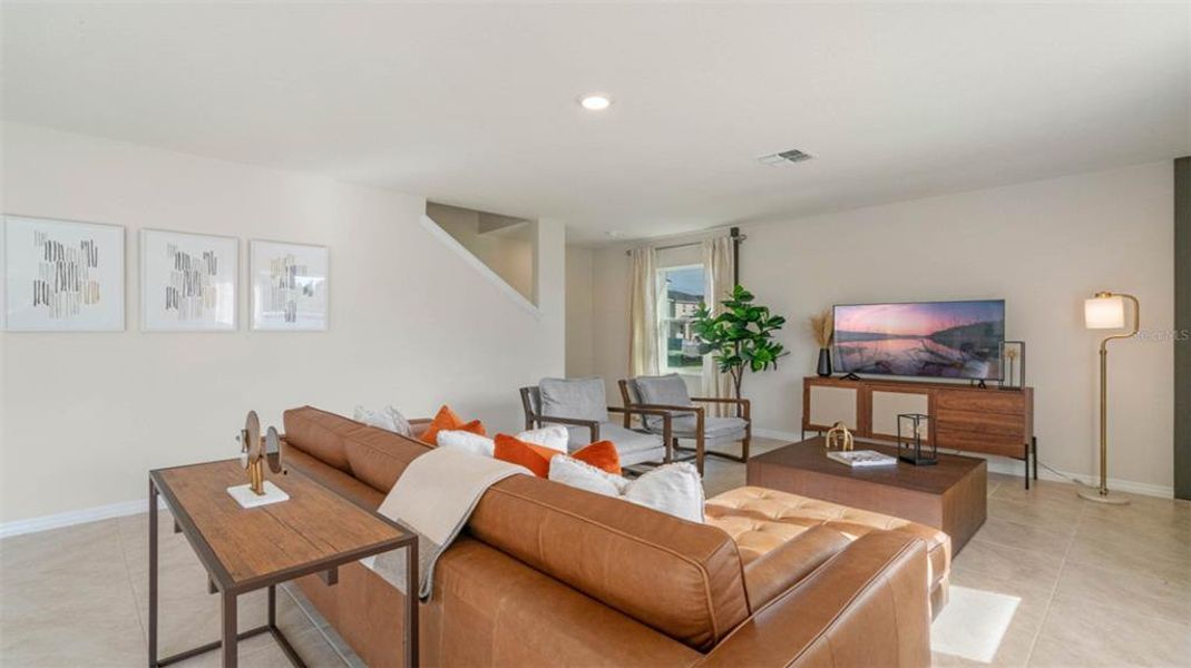 Furnished interior view inside a new home in Buena Lago, St. Cloud (Image 10).
