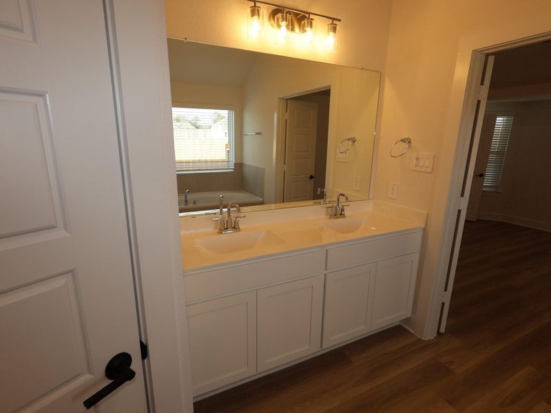 Furnished interior view inside a new home in Lone Star Landing, Montgomery (Image 8).