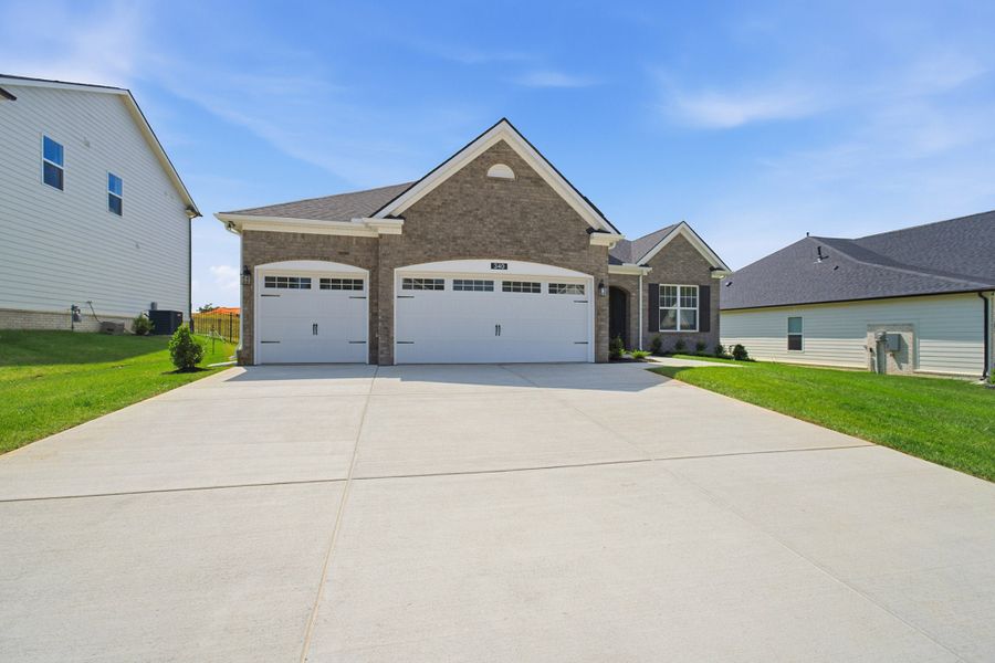 Front exterior of a new home in Dorris Farm, White House, TN, highlighting curb appeal (Image 27).