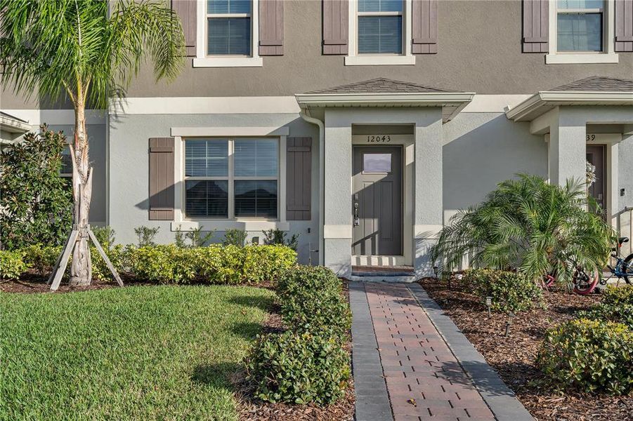 Front exterior of a new home in , Winter Garden, FL, highlighting curb appeal (Image 19).