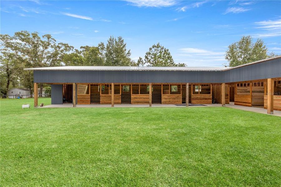 Front exterior of a new home in , Ocala, FL, highlighting curb appeal (Image 2). Front exterior of a new home in , Ocala, FL, highlighting curb appeal (Image 2).