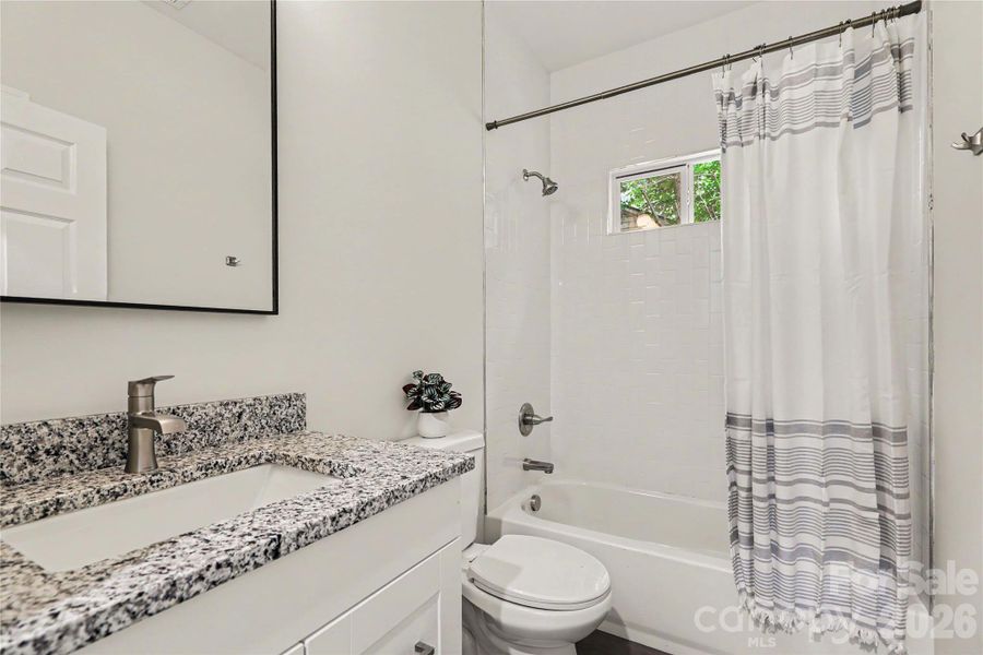 Secondary Full Bath with grantie coutner tops