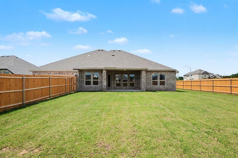 Exterior details and patio area of a home in Ten Mile Creek Estates, DeSoto (Image 3).