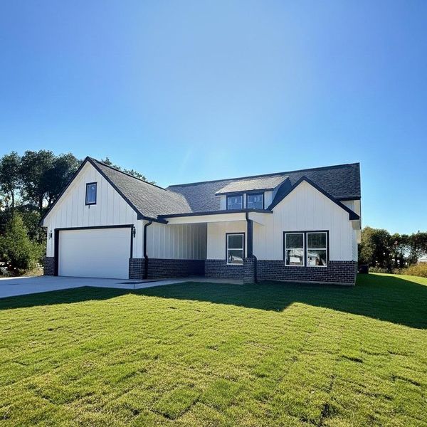 Front exterior of a new home in , Cleveland, TX, highlighting curb appeal (Image 17). Front exterior of a new home in , Cleveland, TX, highlighting curb appeal (Image 17).