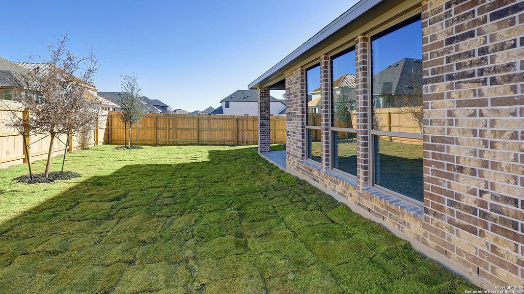 Exterior details and patio area of a home in Corley Farms 50', Boerne (Image 4).