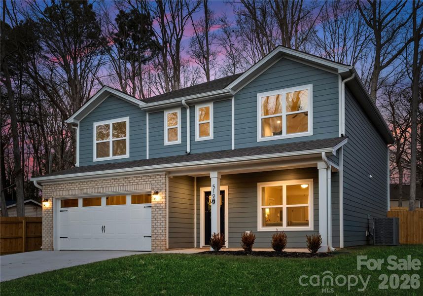 Front exterior of a new home in , Charlotte, NC, highlighting curb appeal (Image 26). Front exterior of a new home in , Charlotte, NC, highlighting curb appeal (Image 26).