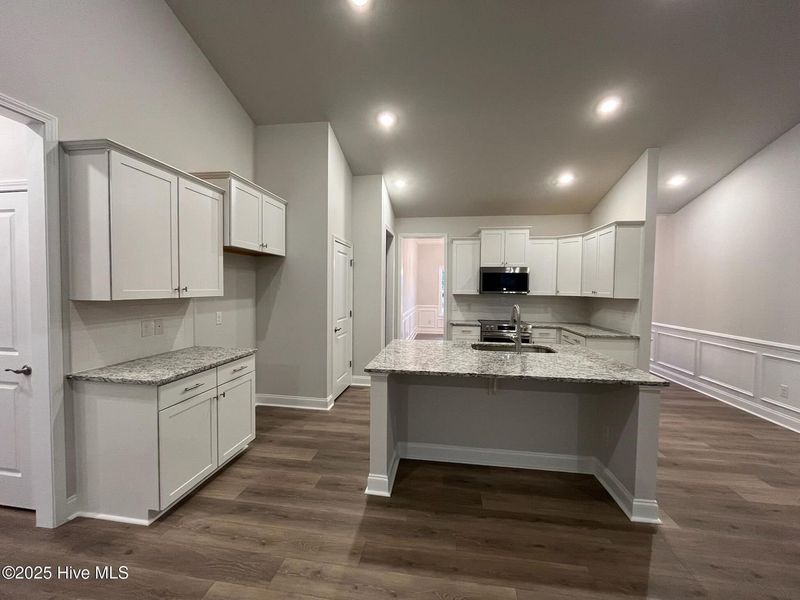 Furnished interior view inside a new home in Palmetto Creek, Bolivia (Image 5).