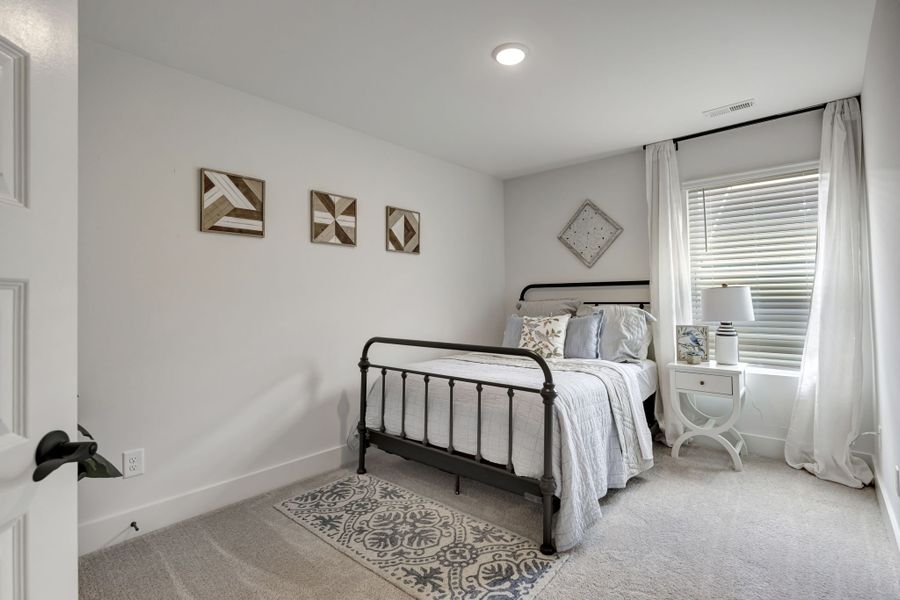 Comfortable Guest Bedroom in The Henley Model