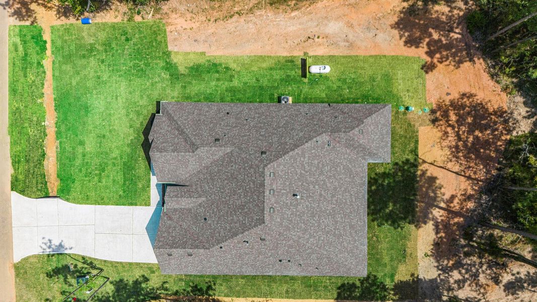 Exterior details and patio area of a home in Oakwood Ranch, Willis (Image 21). Exterior details and patio area of a home in Oakwood Ranch, Willis (Image 21).