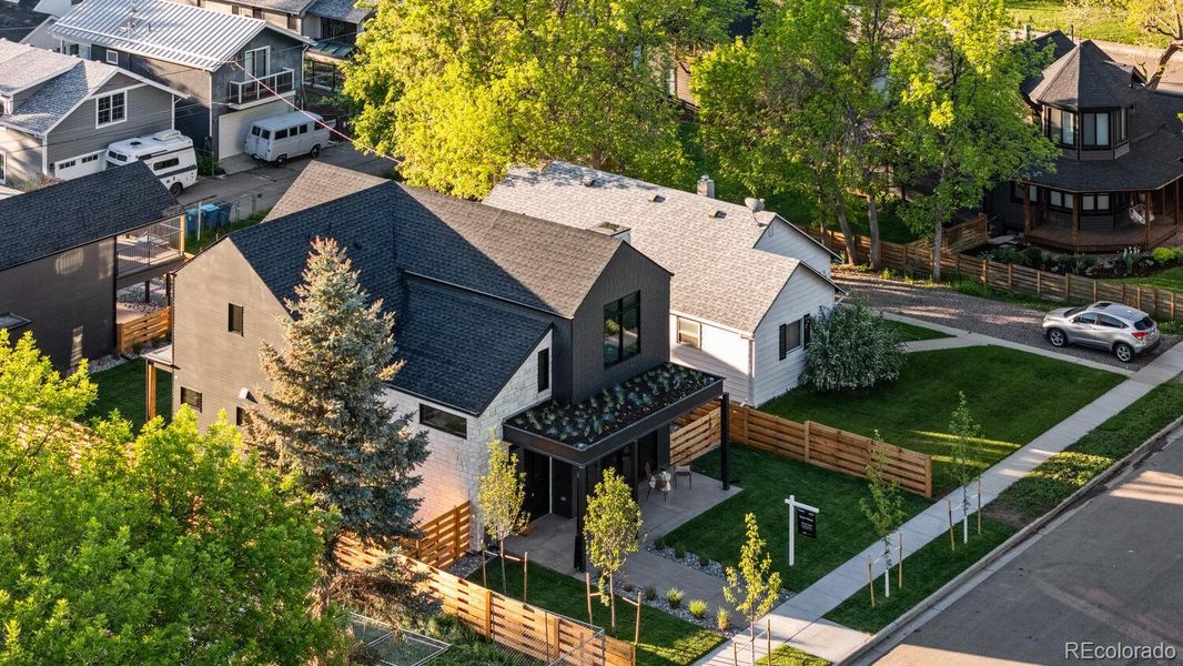 Front exterior of a new home in , Louisville, CO, highlighting curb appeal (Image 21).