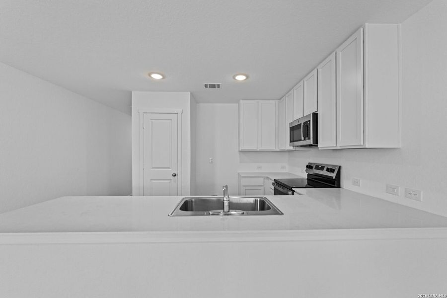 Furnished interior view inside a new home in Guadalupe Ridge, New Braunfels (Image 10). Furnished interior view inside a new home in Guadalupe Ridge, New Braunfels (Image 10).