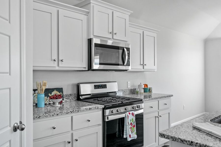 Representative furnished interior of a home built from the BELLVUE by D.R. Horton in Faculty Row, Abilene (Image 13).