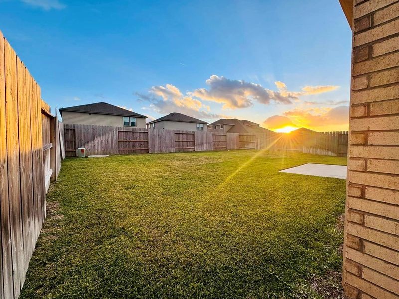 Exterior details and patio area of a home in Sunterra, Katy (Image 2). Exterior details and patio area of a home in Sunterra, Katy (Image 2).