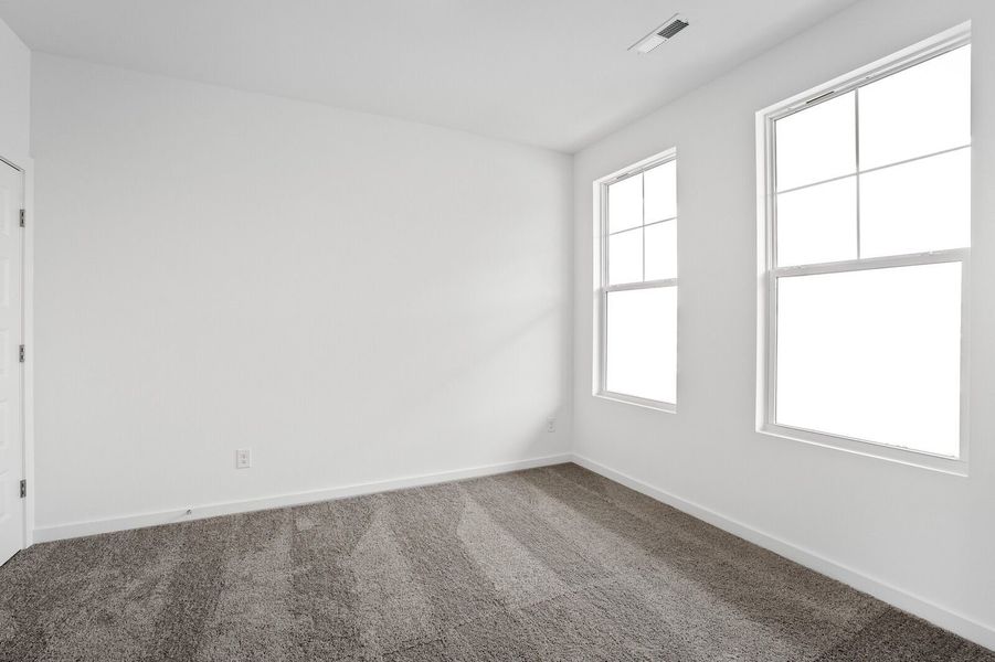 Spacious, unfurnished interior of a new home in Sage Farms, White House (Image 22).