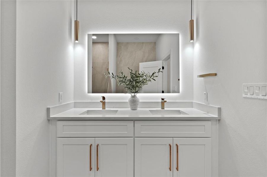 Bathroom featuring double vanity Bathroom featuring double vanity