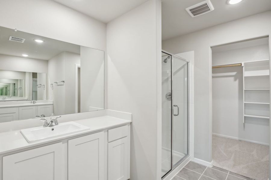 Primary Bathroom in the Sabrina home plan by Trophy Signature Homes – REPRESENTATIVE PHOTO