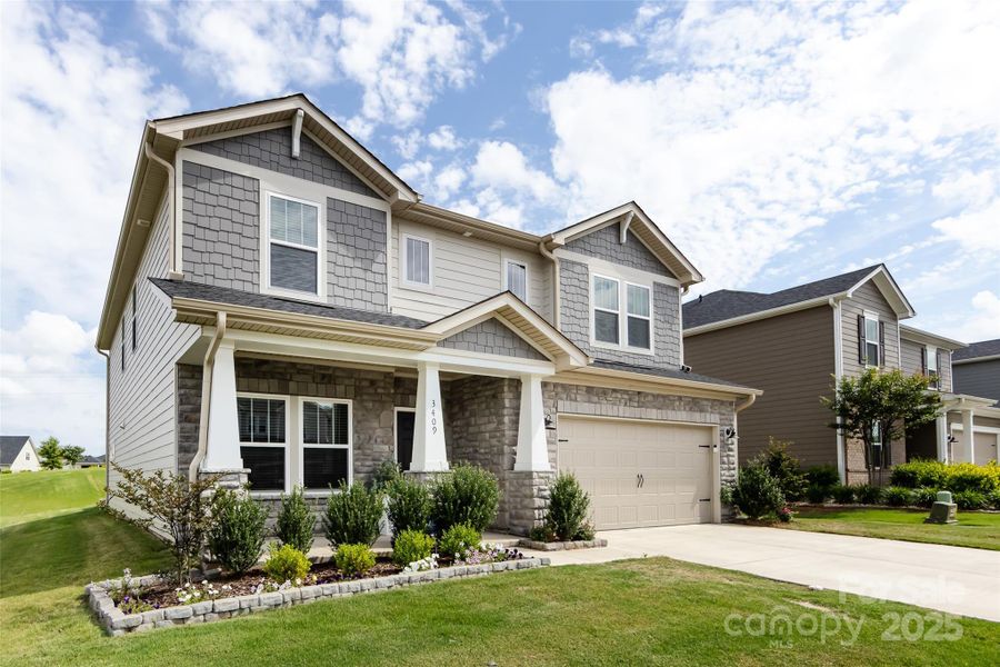 Front exterior of a new home in Simpson Farms, Monroe, NC, highlighting curb appeal (Image 21).
