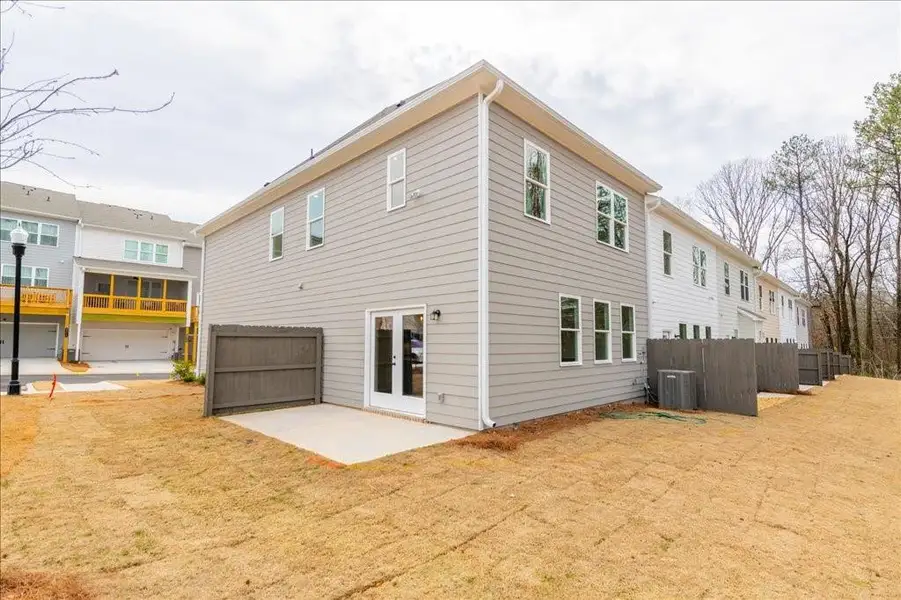 Exterior details and patio area of a home in Cherokee Township, Acworth (Image 25).