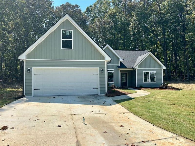 Front exterior of a new home in , Gainesville, GA, highlighting curb appeal (Image 1). Front exterior of a new home in , Gainesville, GA, highlighting curb appeal (Image 1).