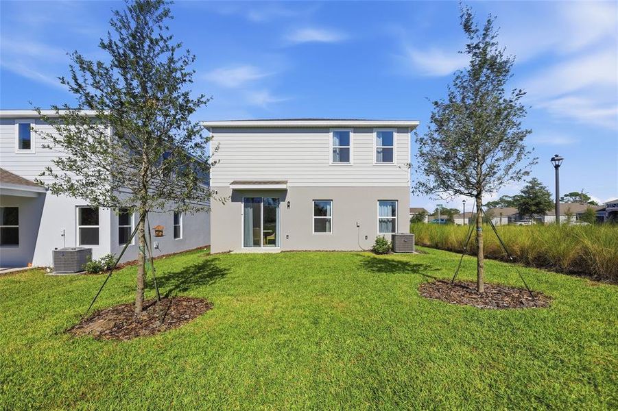 Exterior details and patio area of a home in Lakewood Park, Deland (Image 25).