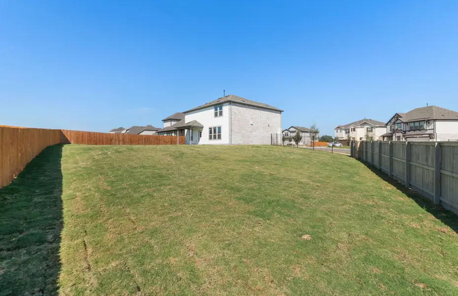 Exterior details and patio area of a home in Saddleback at Santa Rita Ranch, Liberty Hill (Image 2). Exterior details and patio area of a home in Saddleback at Santa Rita Ranch, Liberty Hill (Image 2).