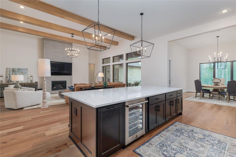 This is the perfect example picture of the extensive open concept floor plan of this home with eye catching features in each individual space cleverly defining the actual functionality of that space.