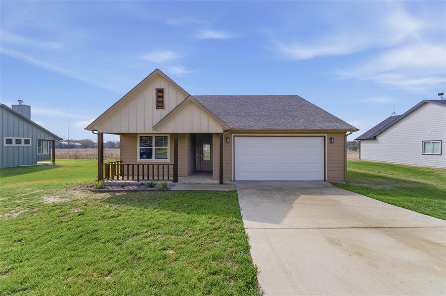 Front exterior view of the home with welcoming curb appeal. Front exterior view of the home with welcoming curb appeal.