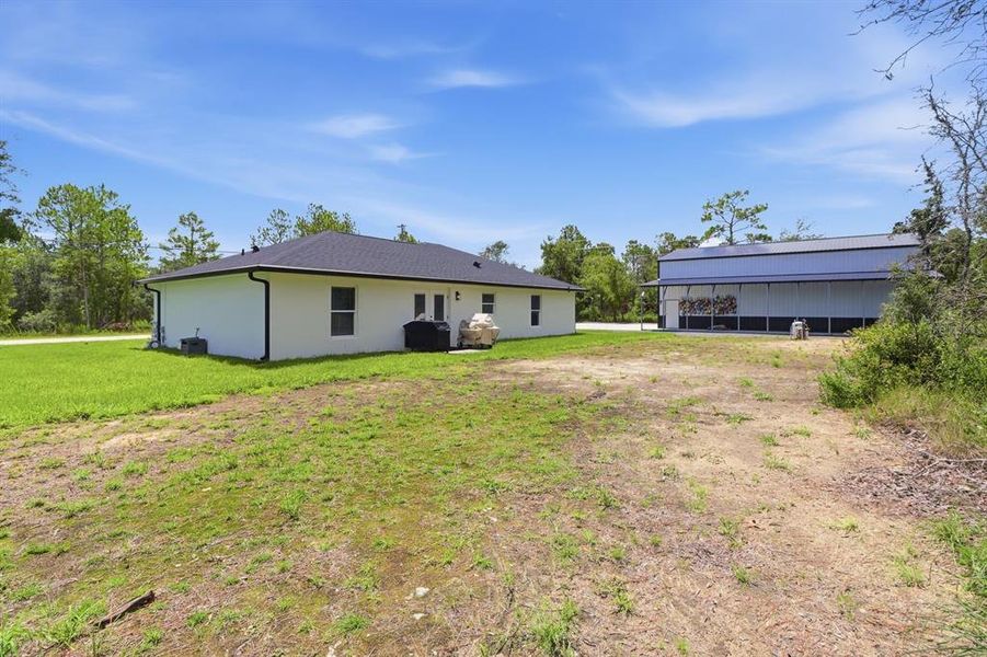 Exterior details and patio area of a home in , Brooksville (Image 4). Exterior details and patio area of a home in , Brooksville (Image 4).