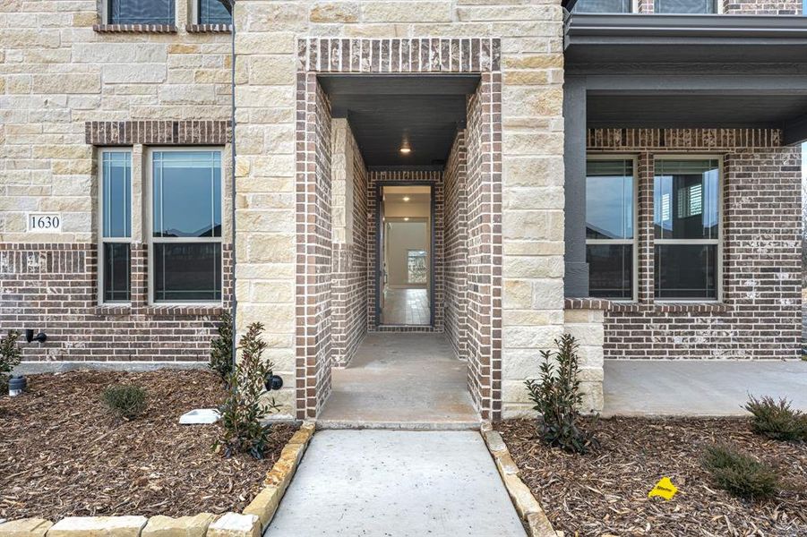 Exterior details and patio area of a home in Sonoma Verde, McLendon-Chisholm (Image 29).