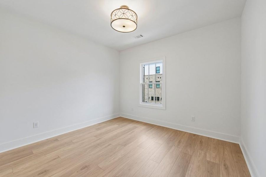 Spacious, unfurnished interior of a new home in Skyview On Broad, Sugar Hill (Image 27).